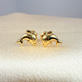 Yellow gold dolphin earring