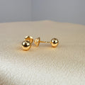 Yellow gold ball stud earring (Balín Liso)