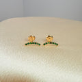 Yellow gold ear jacket earring with green zircon