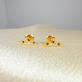 Yellow gold ear jacket earring with flowers and green zircon