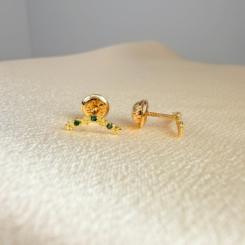 Yellow gold ear jacket earring with flowers and green zircon