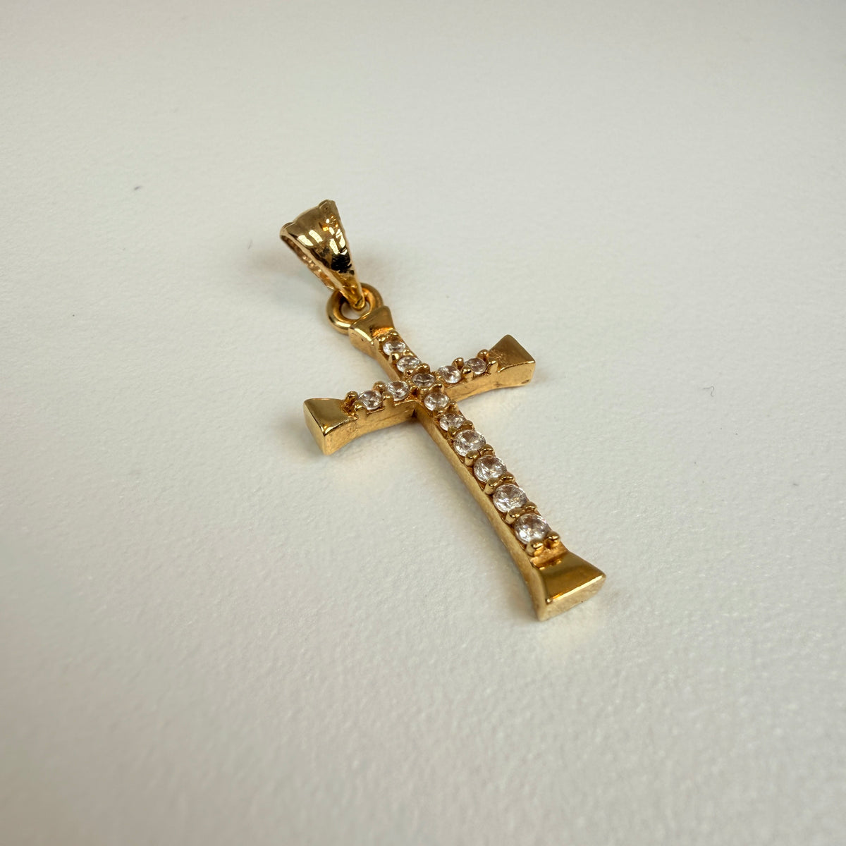 Yellow gold zircon crucifix pendant